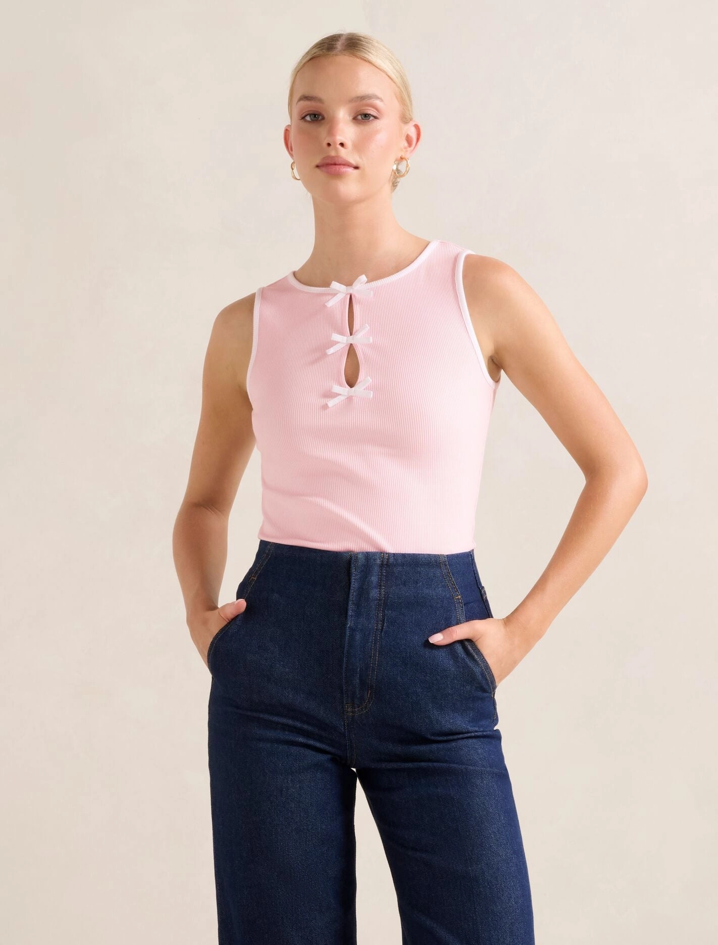 Wide Shoulder Cut High Collar Design Brookie Bow Front Tank Top